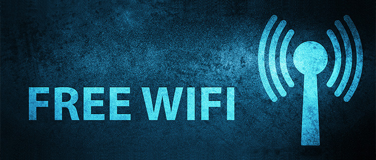 Schriftzug Free Wifi mit Funksymbol auf blau-schwarzem Hintergrund